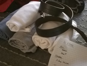 rolled clothes and packing list